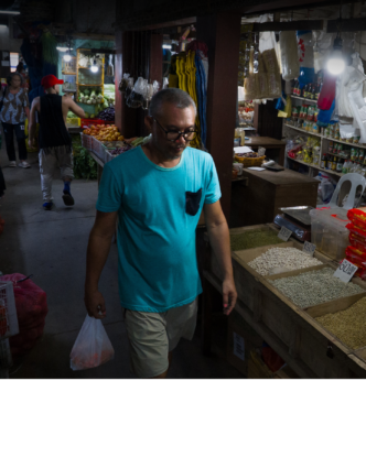 Man walking through Tiangge market